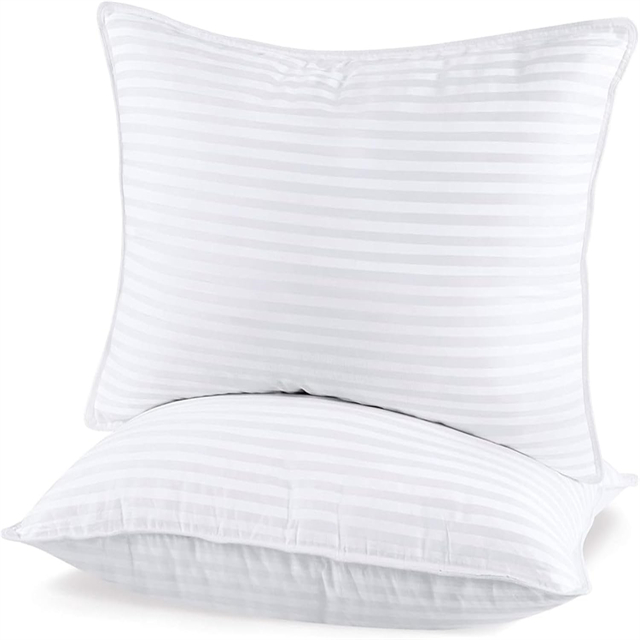 Close - up of striped polyester sleeping pillow