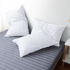  Striped pillow on bed