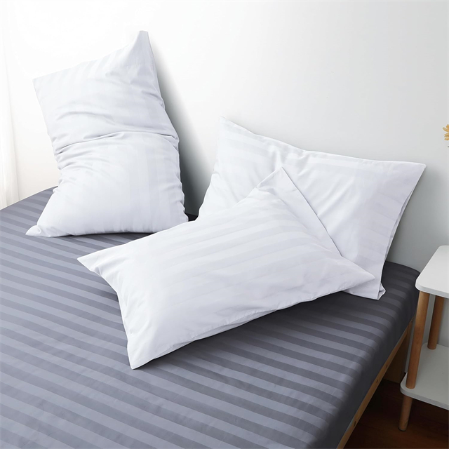  Striped pillow on bed
