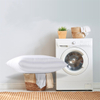 Striped pillow by washing machine