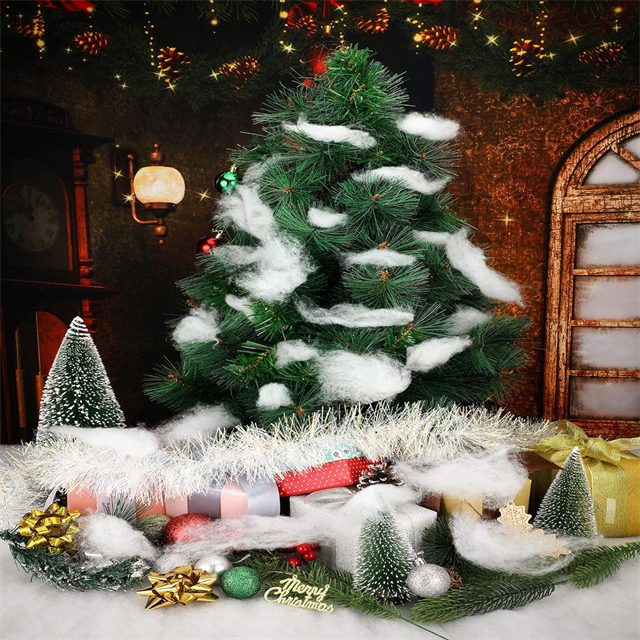 Christmas tree surrounded by polyester snow fluff